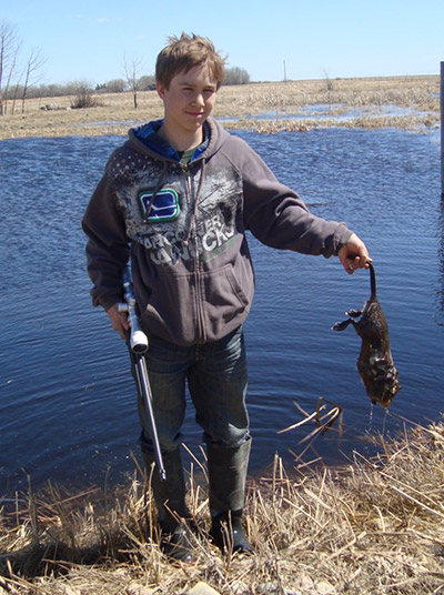 Jacob Leicht hunting and shooting a muskrat